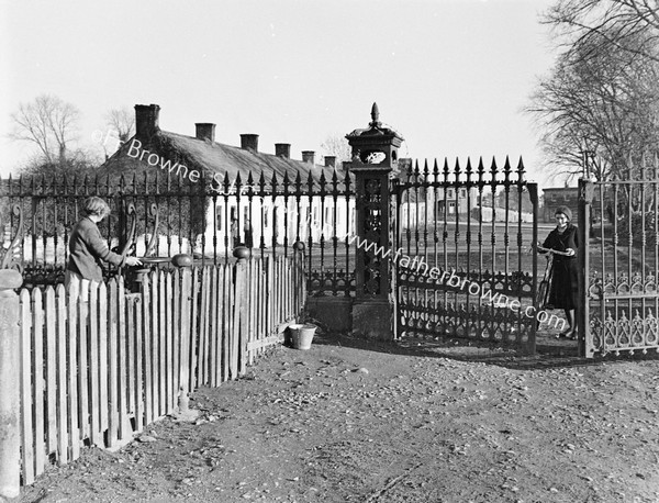 MECHENICALLY OPERATED GATES LEADING TO FACTORY ROAD TO CURRAGMORE